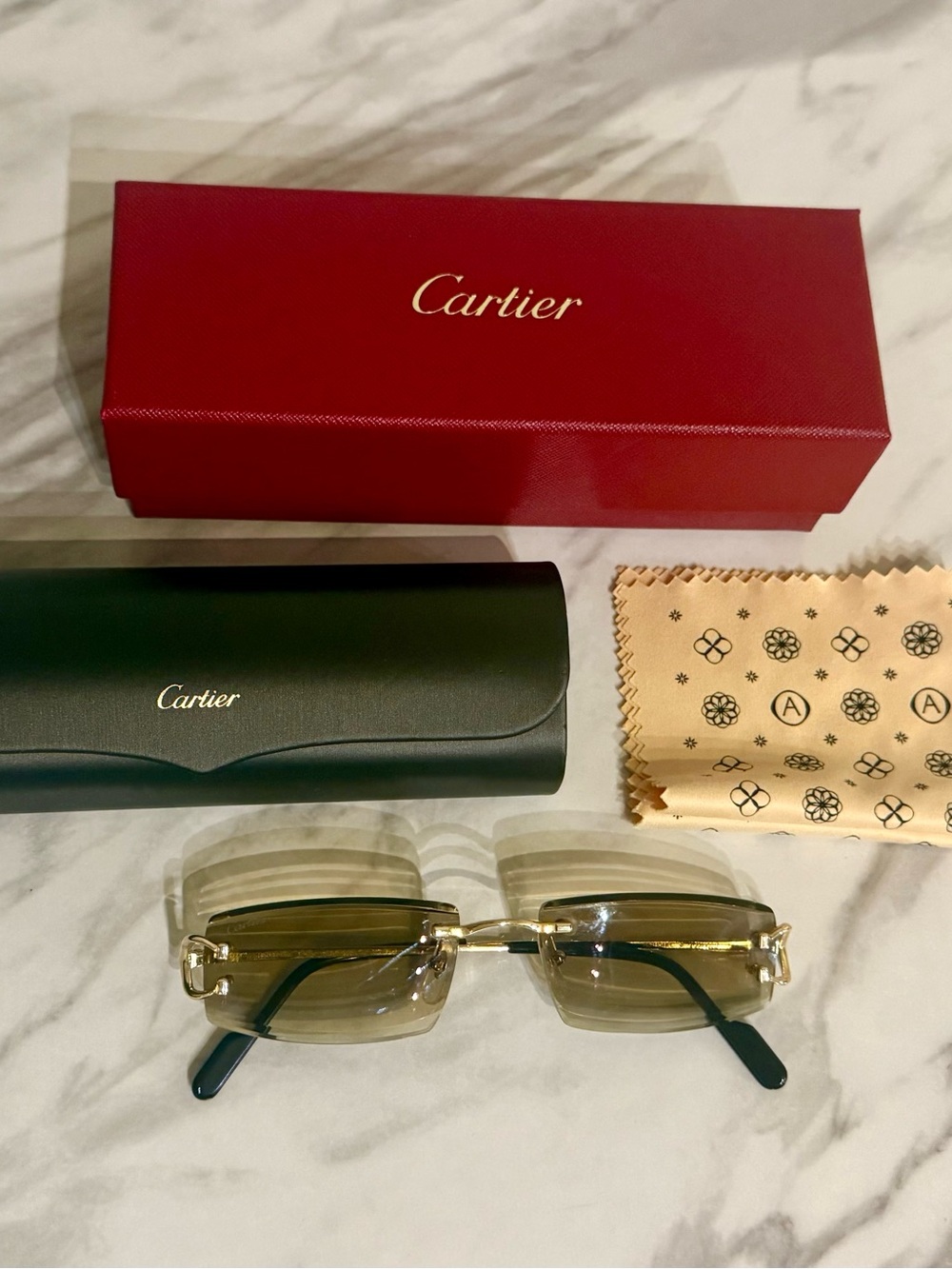 Cartier Rimless Sunglasses in Gold with Brown Tinted Lenses
